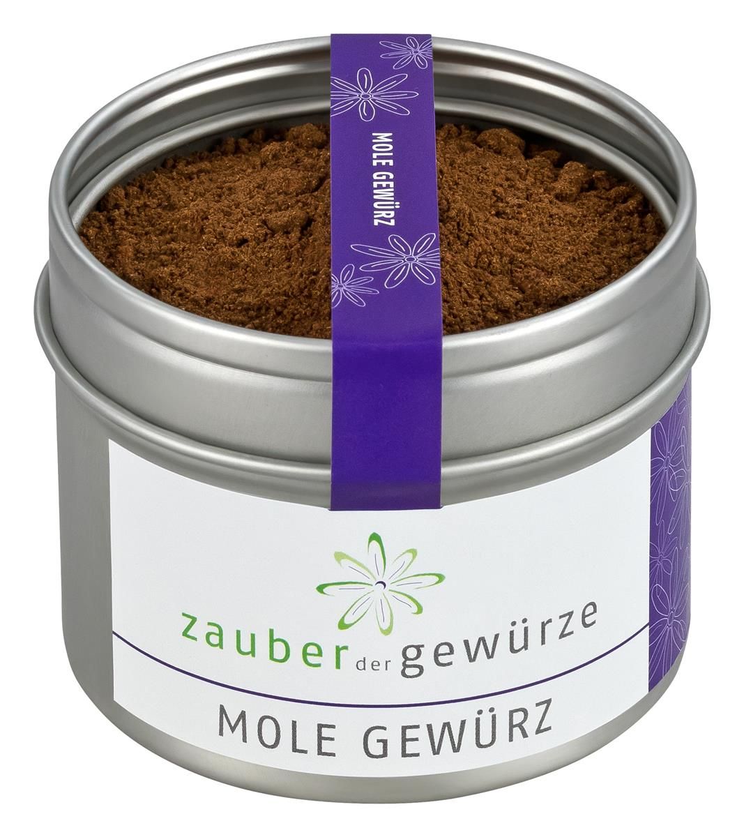Runde Dose mit braunem Pulver. Aufkleber mit "Zauber der Gewürze Mole Gewürz". Lila Band mit Schriftzug.