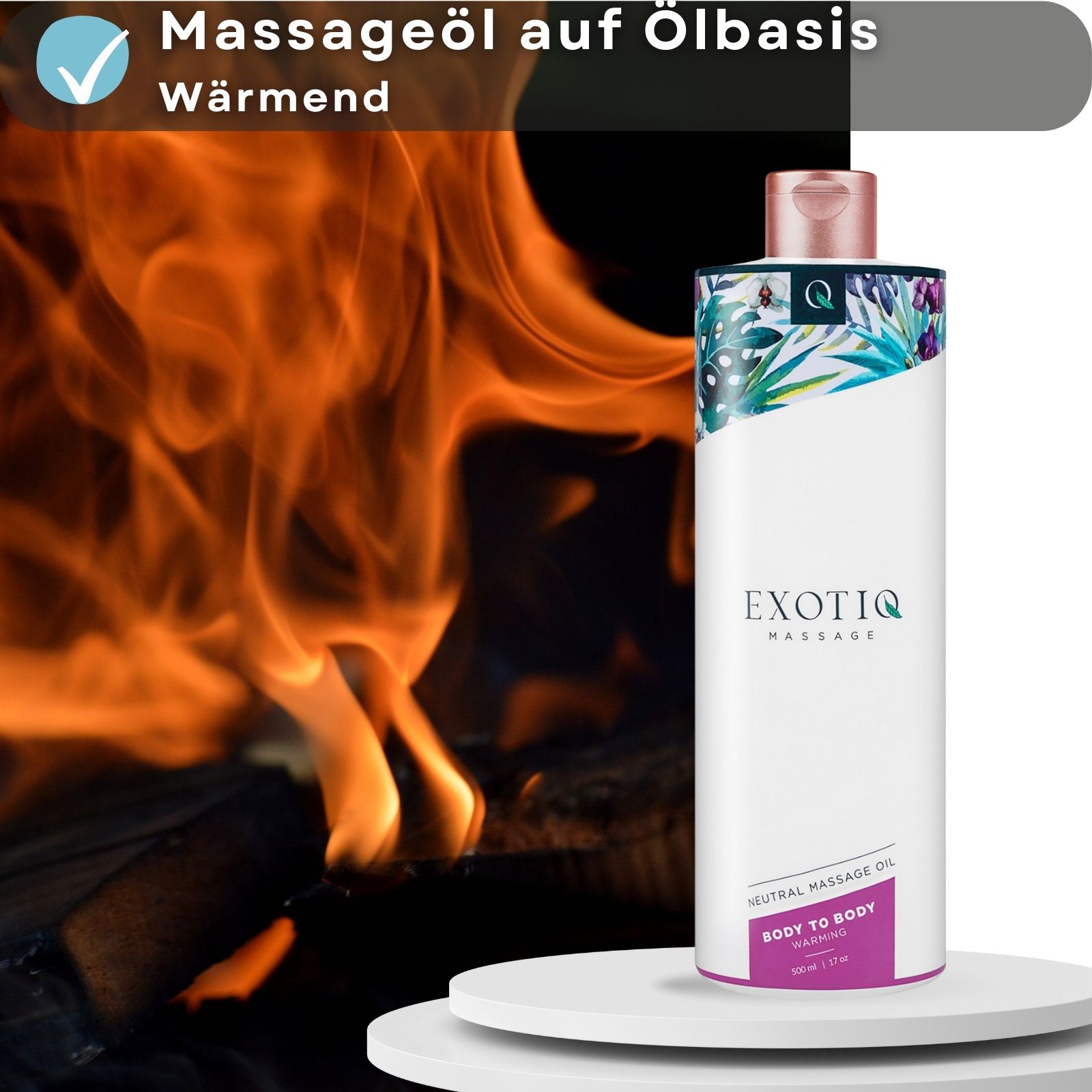 Massageöl-Flasche vor Kaminfeuer. Text: Body to Body Warming.