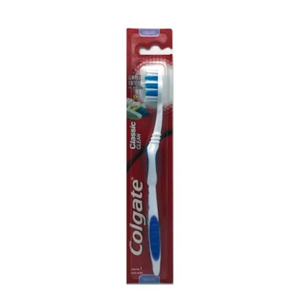 Colgate Classic Zahnbürste in Verpackung. Blauer Griff, weiße Borsten. "Classic Clean" Text. Verpackung mit Aufhängevorrichtung.
