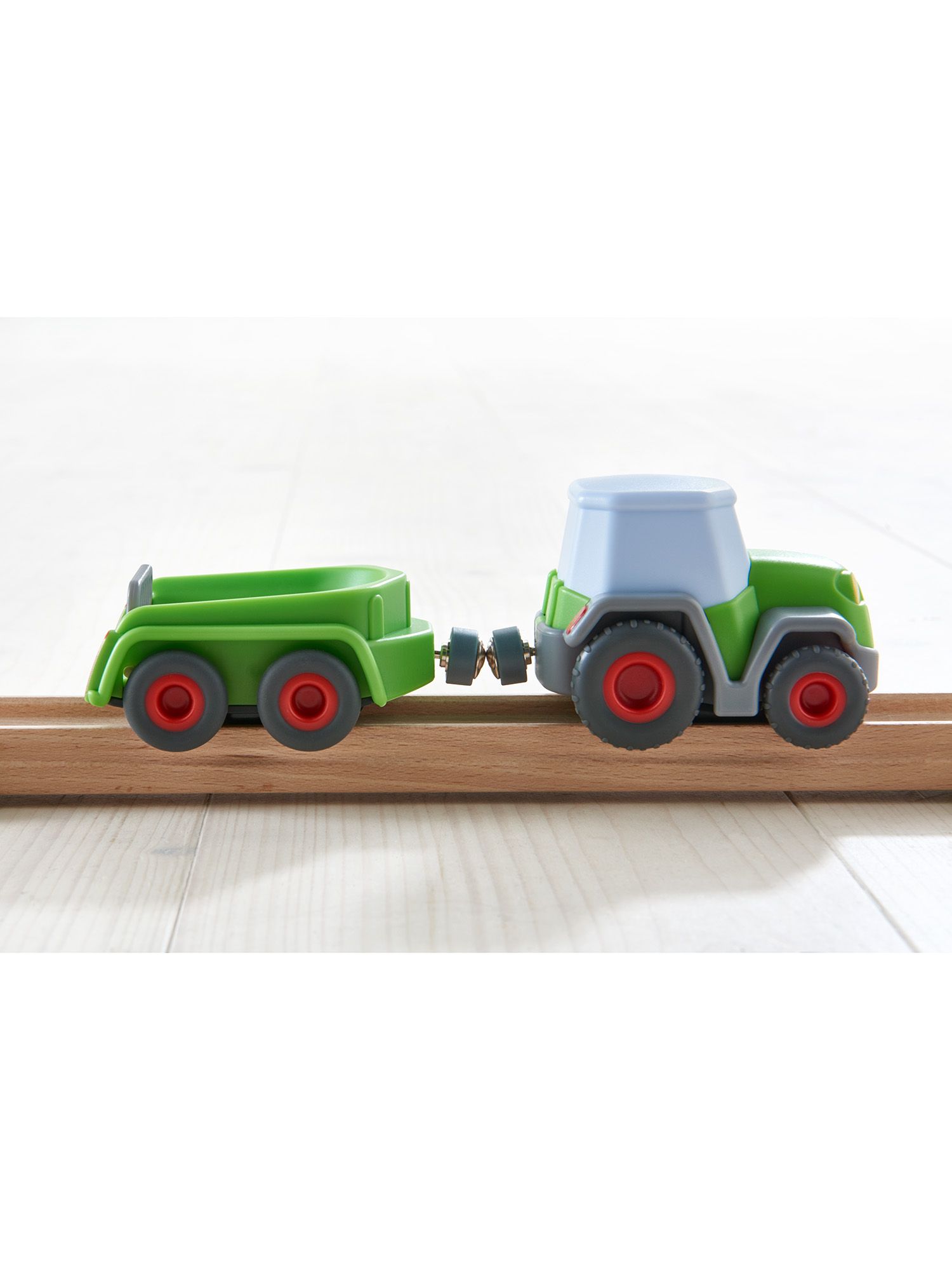 HABA Spielzeug-Traktor Kullerbü - Traktor mit Anhänger