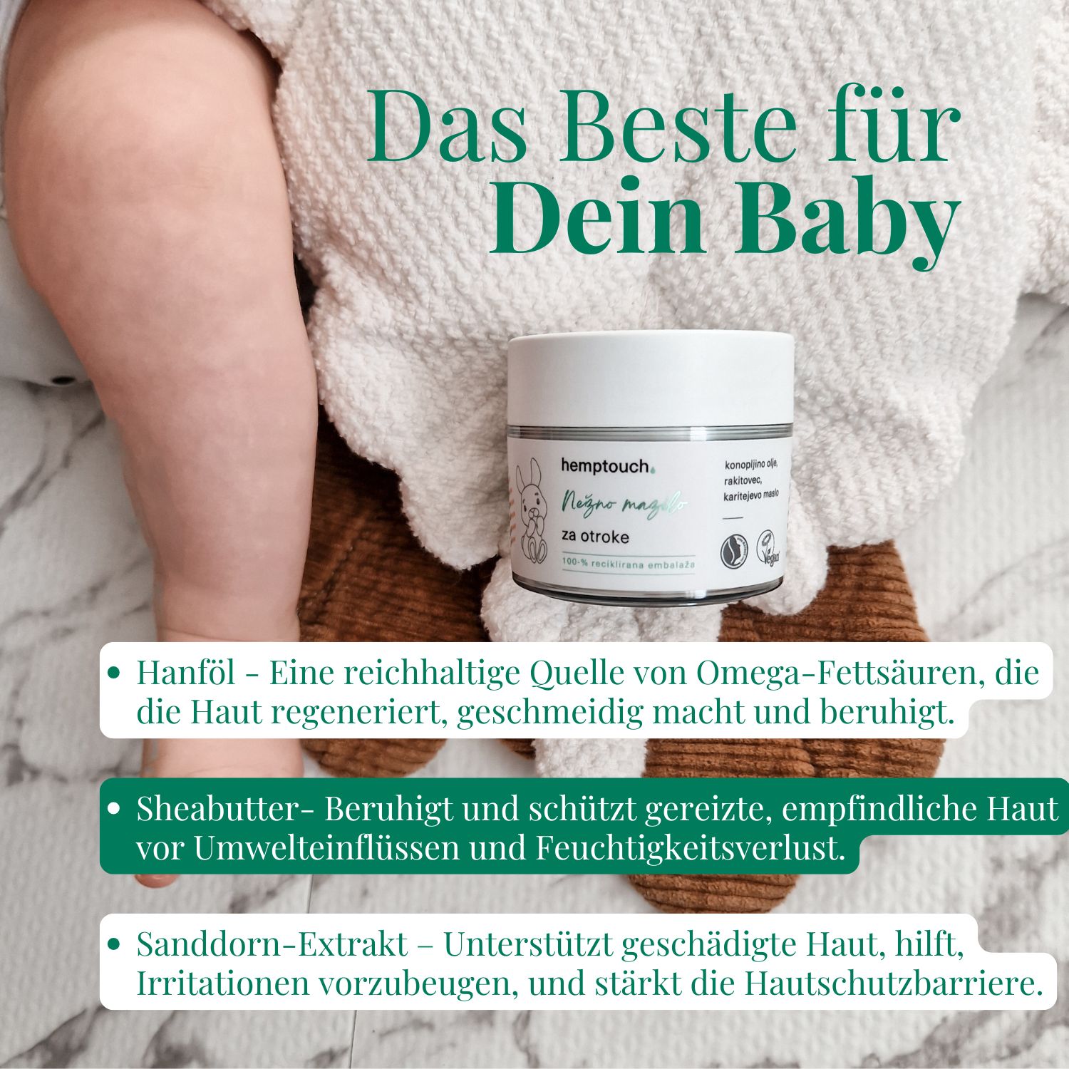 Babybalsam-Tiegel auf Babyfüßen. Text: Das Beste für Dein Baby. Inhaltsstoffe: Hanföl, Sheabutter, Sanddorn-Extrakt. Vegan-Siegel.