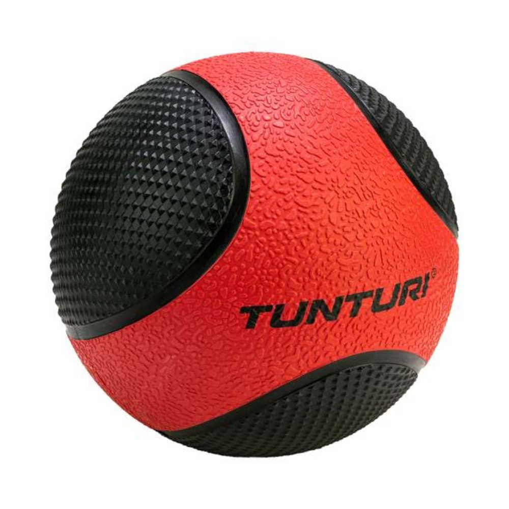Roter Medizinball mit schwarzen Segmenten. Oberfläche strukturiert. Schwarzer Schriftzug TUNTURI.