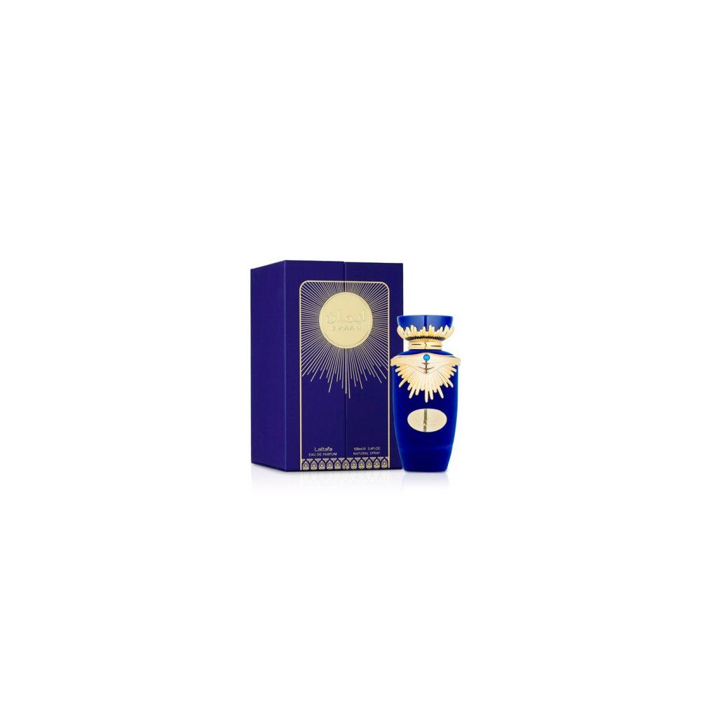 Blaue Parfümflasche mit goldener Verzierung und blauer Schachtel. Goldene Sonne und arabische Schrift. Marke Lattafa.