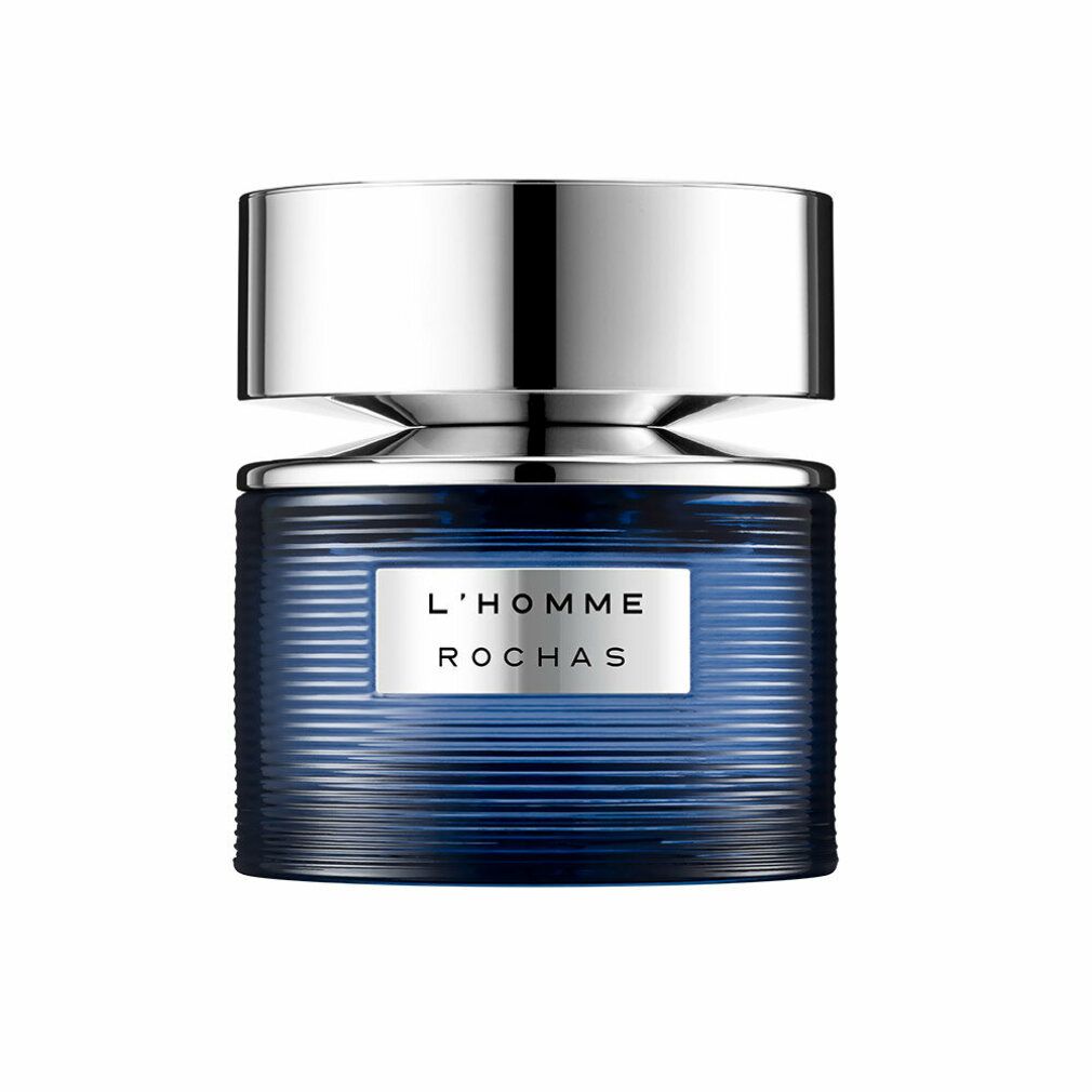 Blauer Glasflakon mit silbernem Deckel. Aufschrift: L'HOMME ROCHAS. Geriffelte Textur.