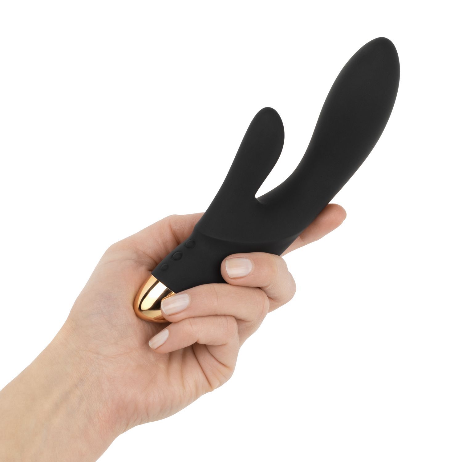 Schwarzer Rabbit-Vibrator mit goldener Spitze, gehalten in einer Hand.