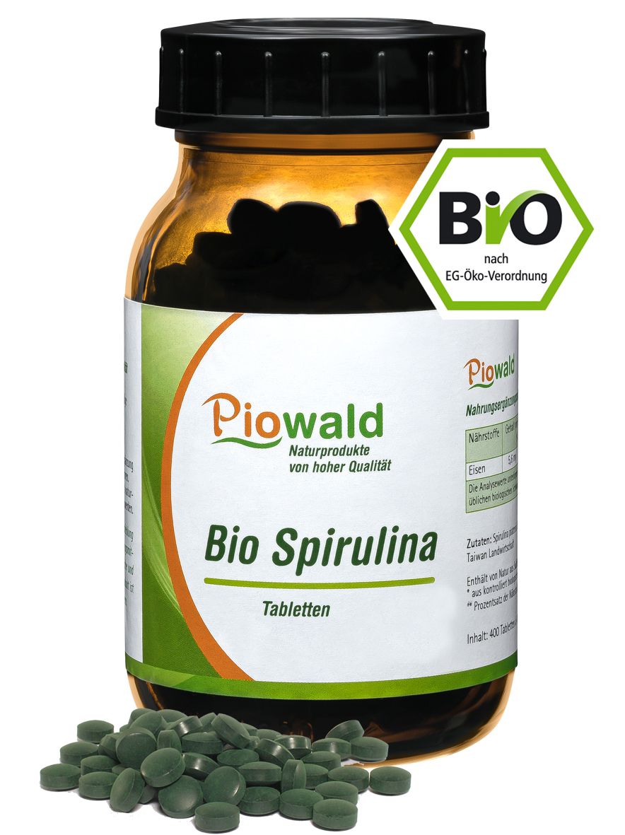 Braune Glasflasche mit schwarzen Deckel und grünen Tabletten. Aufschrift: Piowald Bio Spirulina Tabletten. BIO-Siegel.
