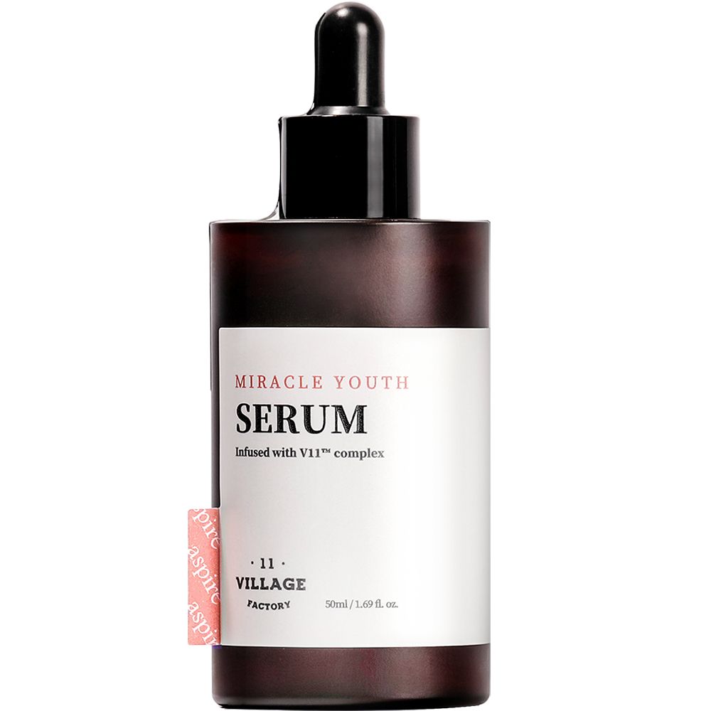 Braune Serumflasche mit schwarzem Deckel und Pipette. Aufschrift: Miracle Youth Serum, Infused with V11™ complex. Label mit Logo.