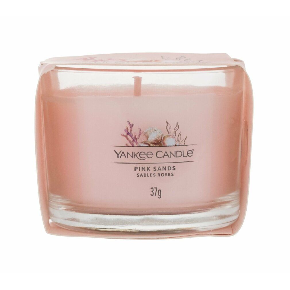 Rosa Yankee Candle im Glas. Aufschrift: Pink Sands, 37g. Abbildung von Muscheln und Korallen.