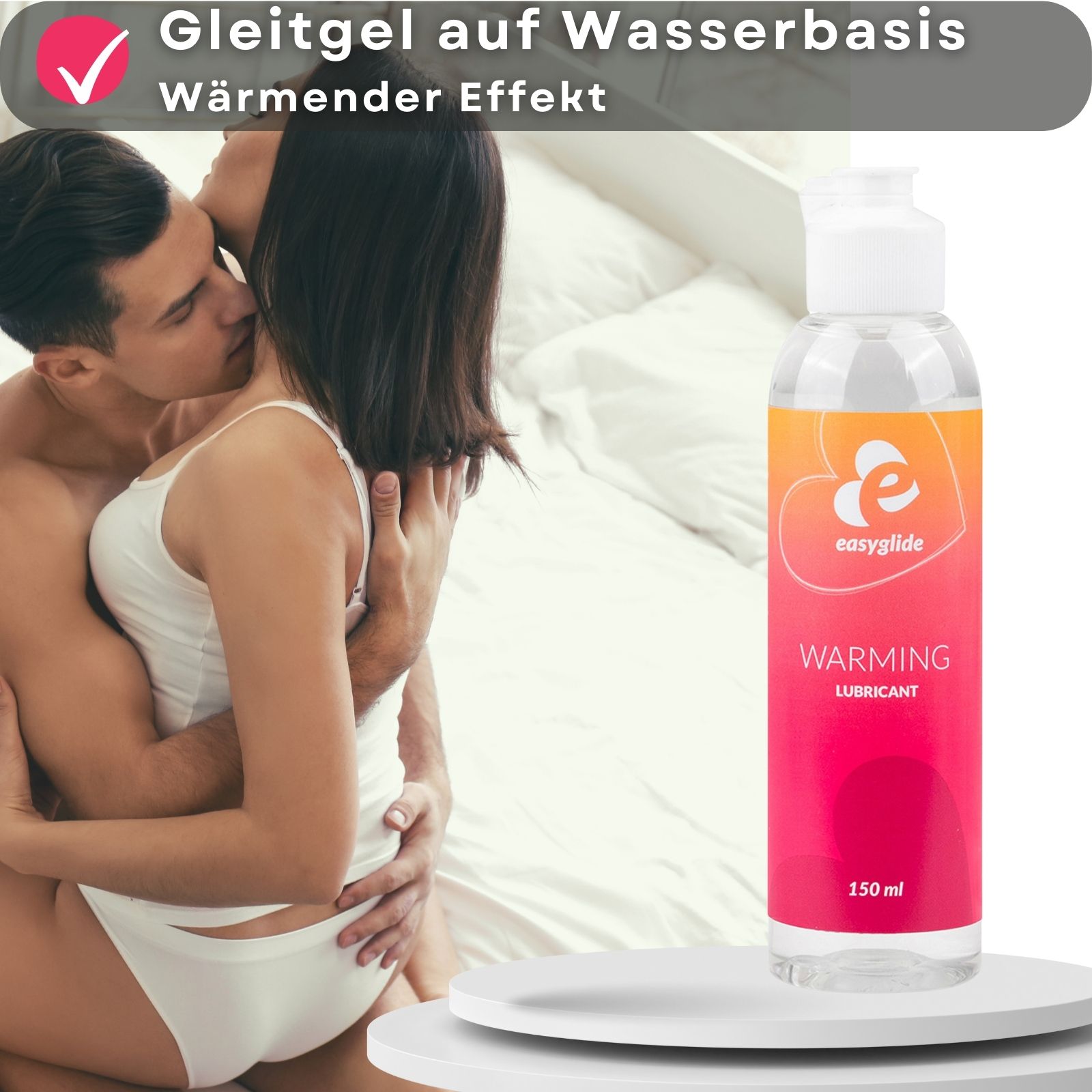 Easyglide-Flasche. Aufschrift: Warming Lubricant. 150 ml. Paar umarmt sich.