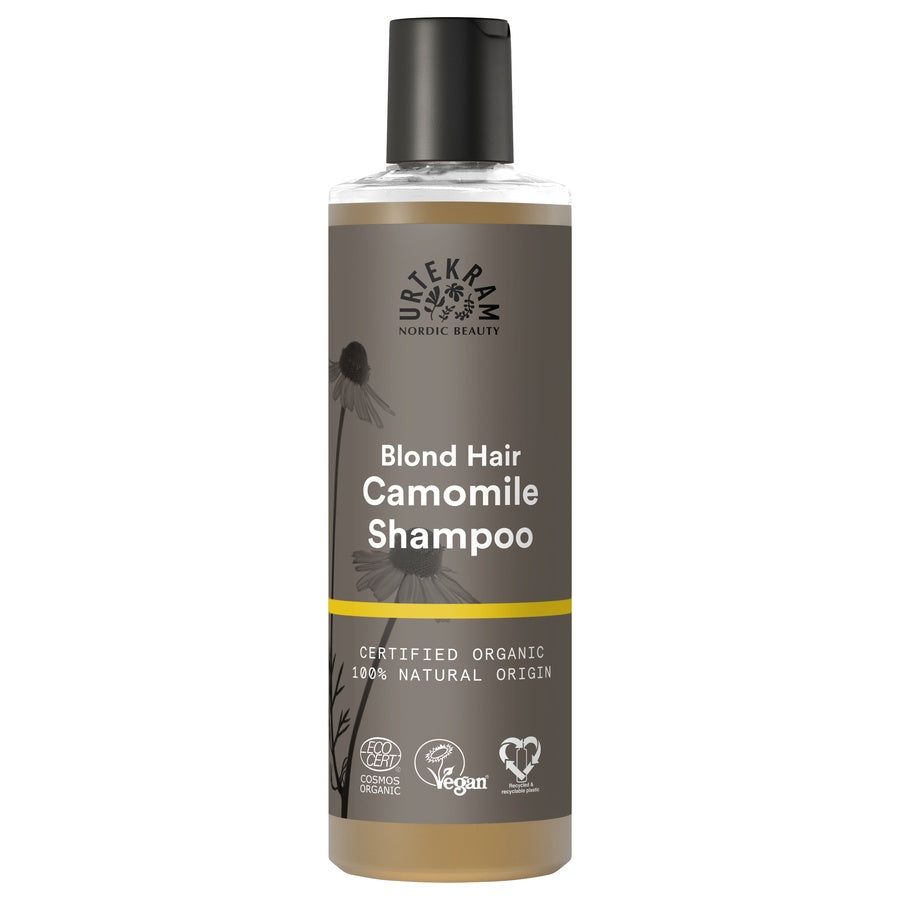 Urtekram Camomile Shampoo Bio. Flasche mit schwarzem Deckel. Aufschrift: Blond Hair Camomile Shampoo. Zertifiziertes Bio-Produkt.