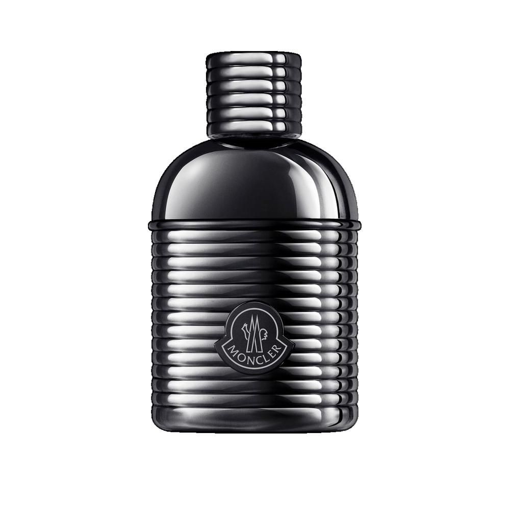 Dunkle Flasche mit geriffelter Oberfläche und Logo. Der Verschluss ist ebenfalls geriffelt. Das Logo ist rund und zeigt ein Emblem.