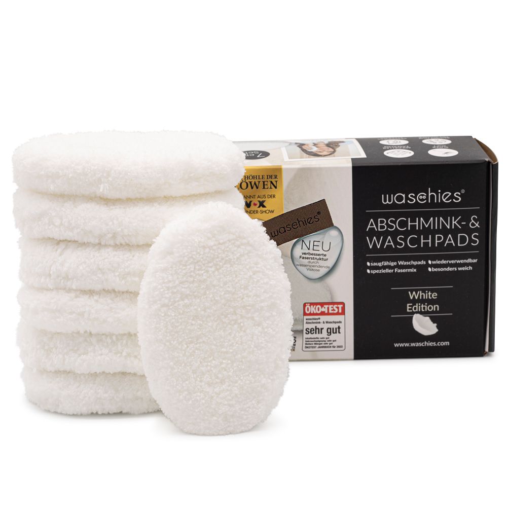 Weiße, runde Abschminkpads und Verpackung. Auf der Verpackung steht "waschies" und "Abschmink- & Waschpads".