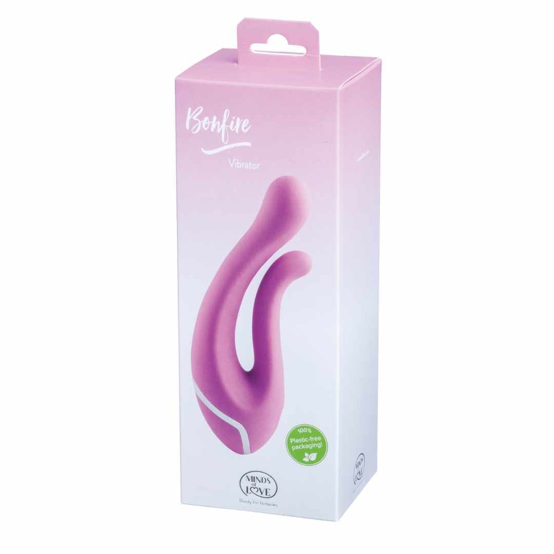 Verpackung mit rosa Vibrator. Aufschrift "Bonfire Vibrator". Logo "MINDS of LOVE". Grün Siegel: 100% plastikfrei.