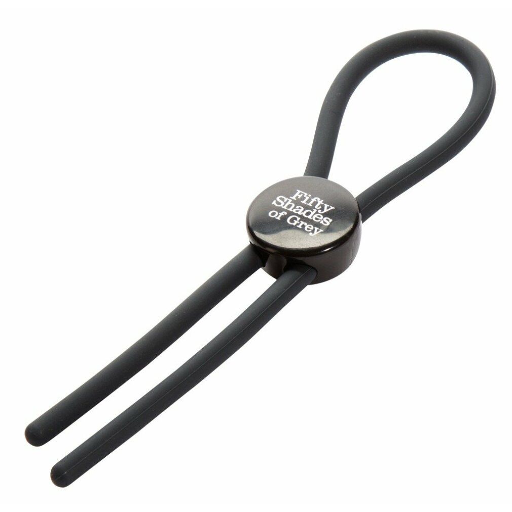 Dunkelgraue Penisschlaufe mit rundem Mittelteil und Schriftzug. Zwei Stränge und ein Ring bilden die Form.