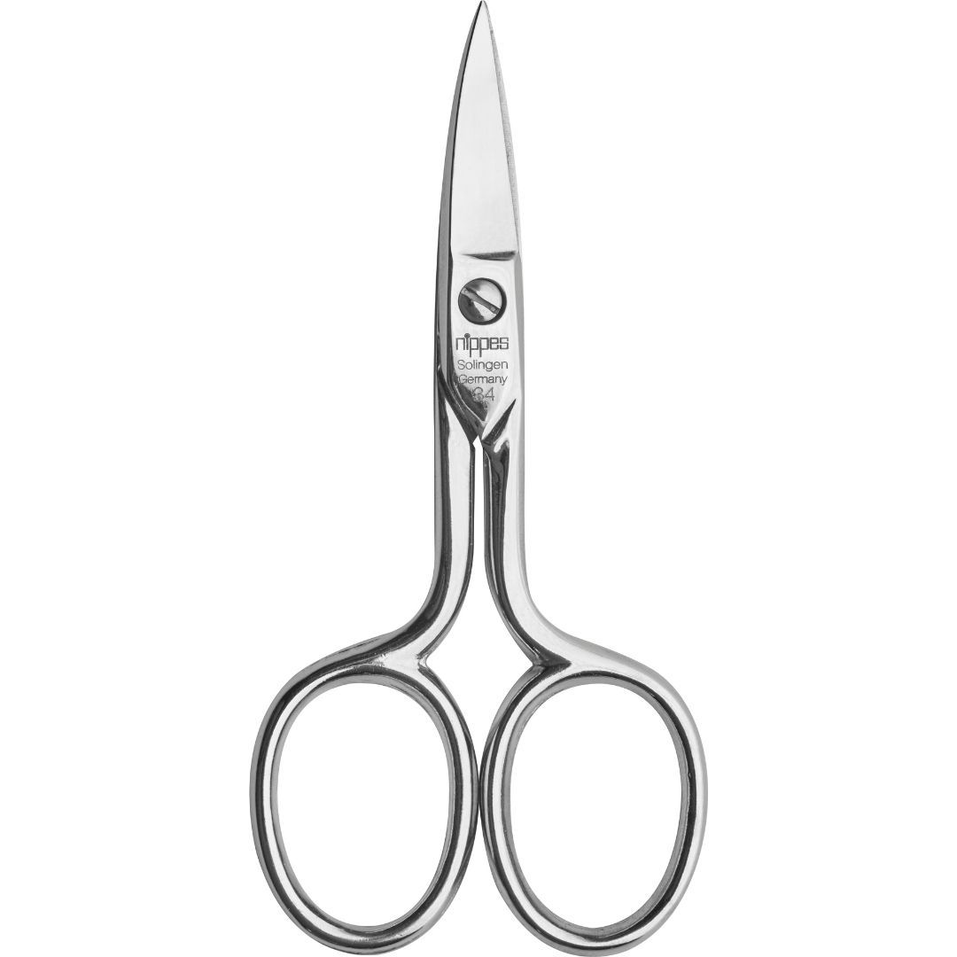 Nagelschere aus Metall. Mit abgerundeten Griffen und spitzer Spitze. Marke Nippes Solingen, Germany.