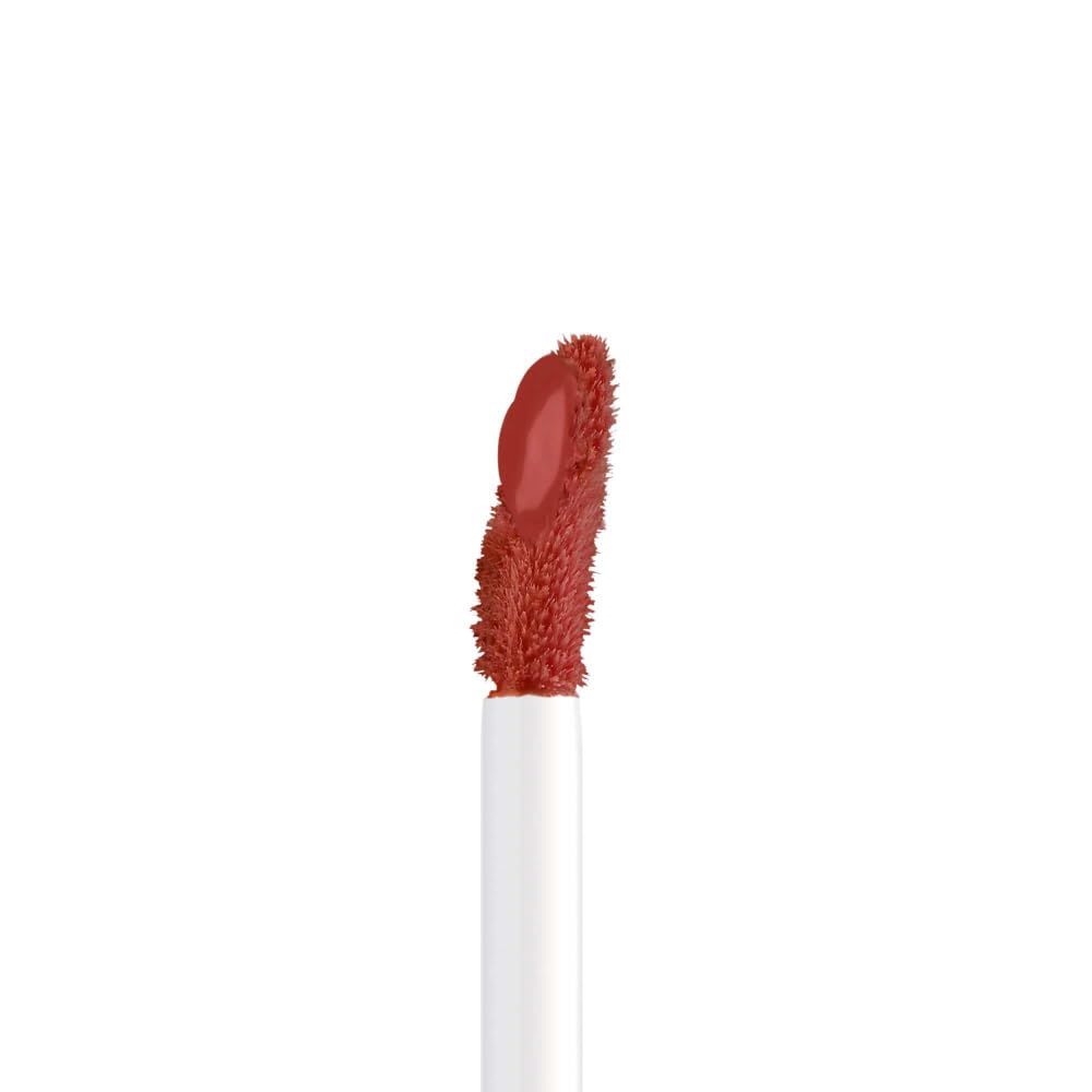 Applikator des Artdeco Mat Passion Lip Fluids mit korallenrotem Fluid.