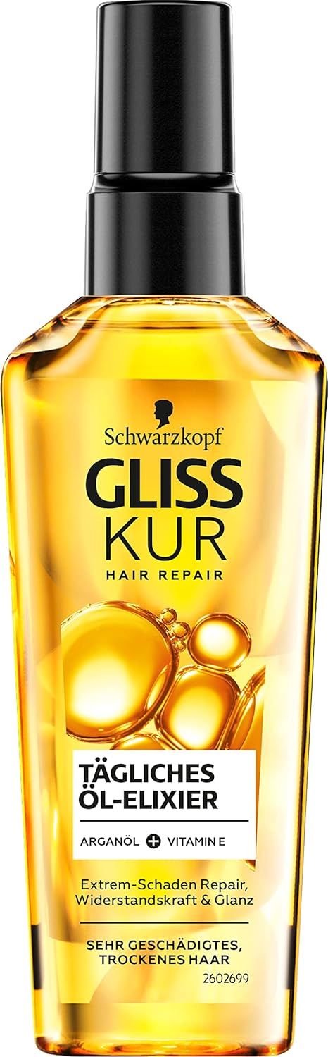 Haaröl-Elixier-Flasche. Schwarzkopf Gliss Kur, tägliches Öl-Elixier. Schwarze Kappe, gelbe Flüssigkeit. Text: Arganöl + Vitamin E, für extrem geschädigtes, trockenes Haar.