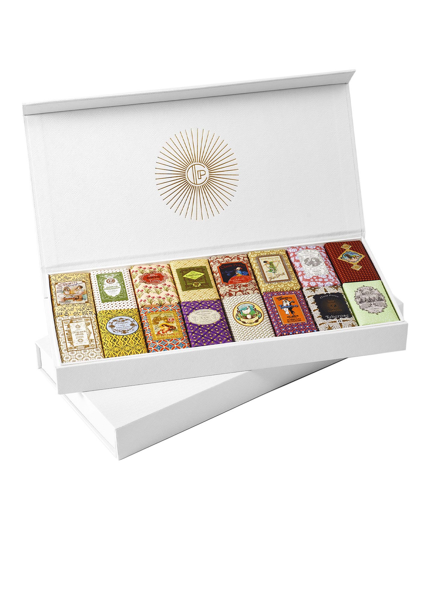 Weißer Geschenkkarton mit 16 Seifen. Deckel mit goldenem Logo. Seifen mit farbigen Mustern und Designs.