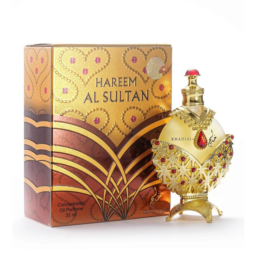 Goldfarbene Flasche mit rotem Schmuck und Karton. Aufschrift: HAREEM AL SULTAN. Konzentriertes Ölparfüm.
