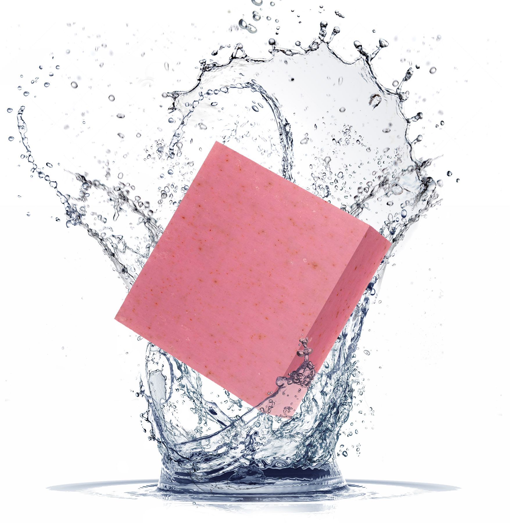 Rosa Seife im Wasser. Die Seife ist von Wasser umgeben, das spritzt.
