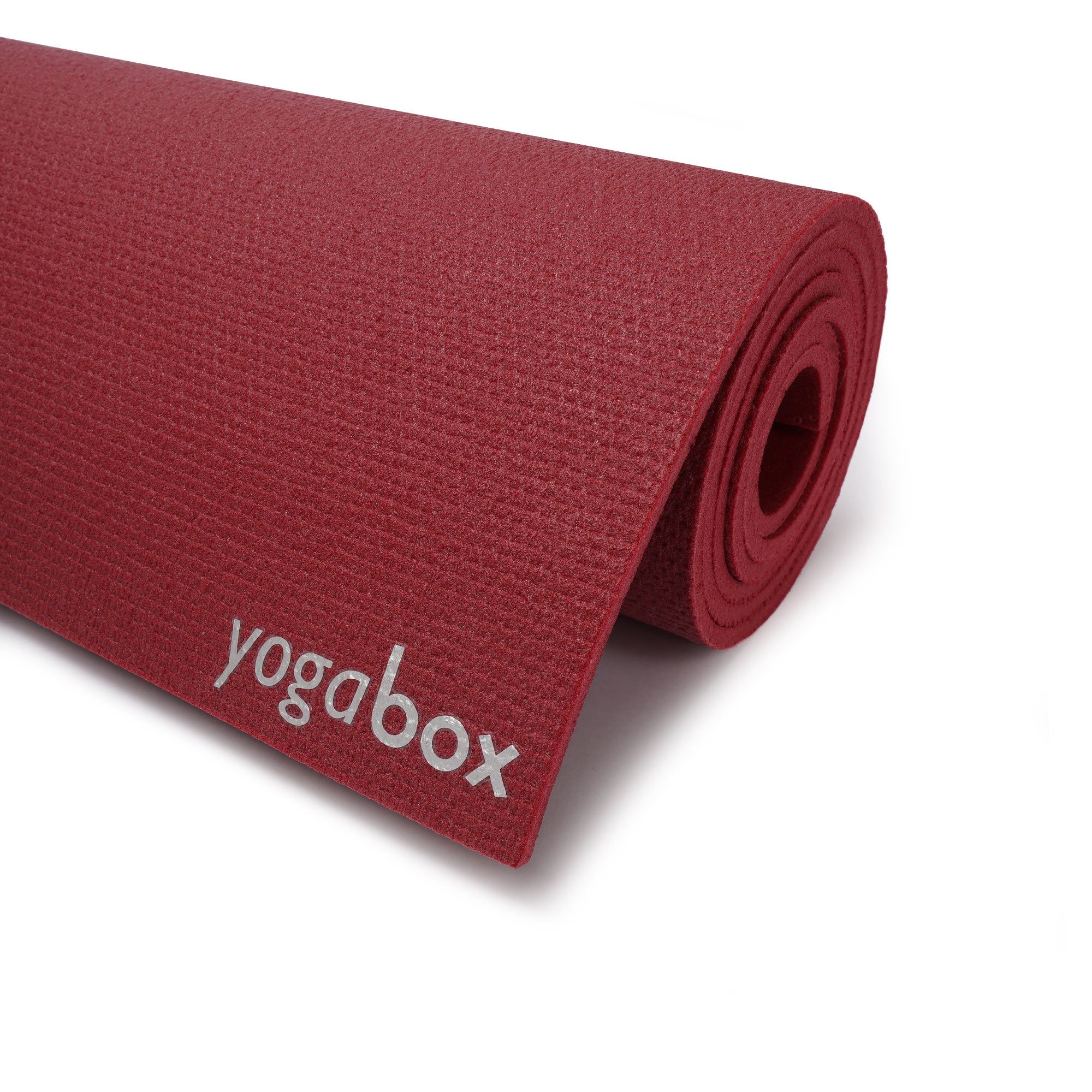 Bordeauxrote Yogamatte mit aufgerolltem Ende und "yogabox" Logo.
