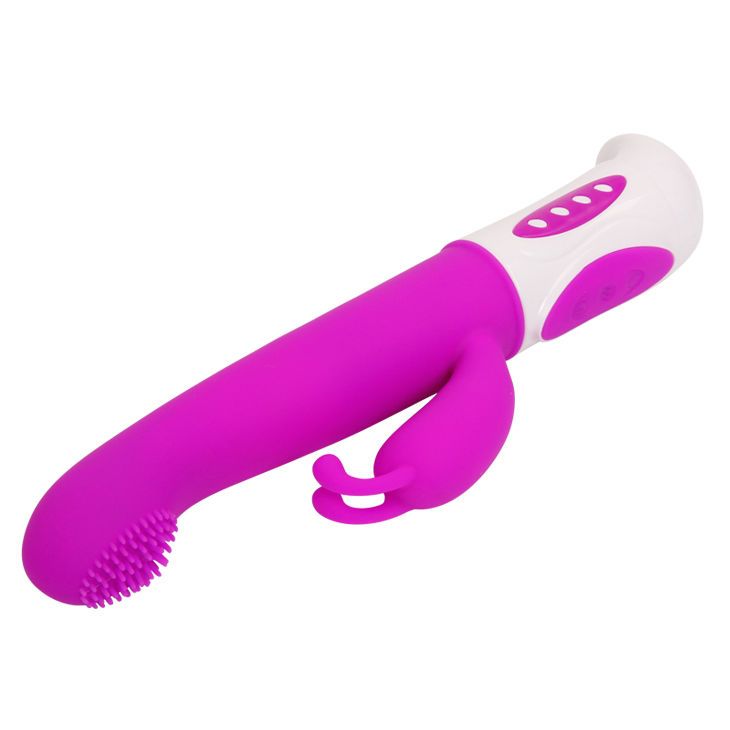 Lila Vibrator mit weißem Griff. Bürstenkopf, zwei seitliche Elemente. Drei Knöpfe am Griff.