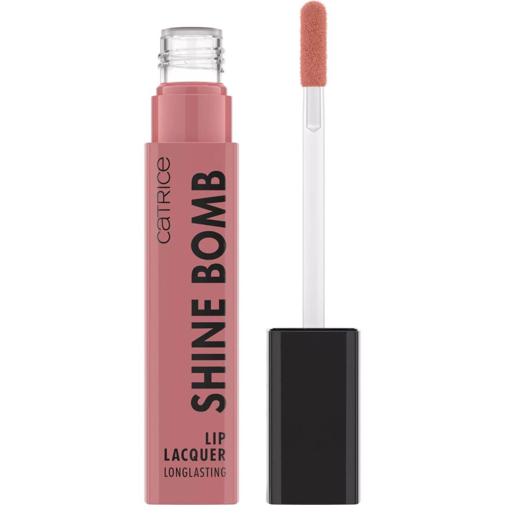 Catrice Shine Bomb Lip Lacquer mit Applikator. Rosa Flüssig-Lippenstift in geöffneter Verpackung. Produktname und Marke sichtbar.