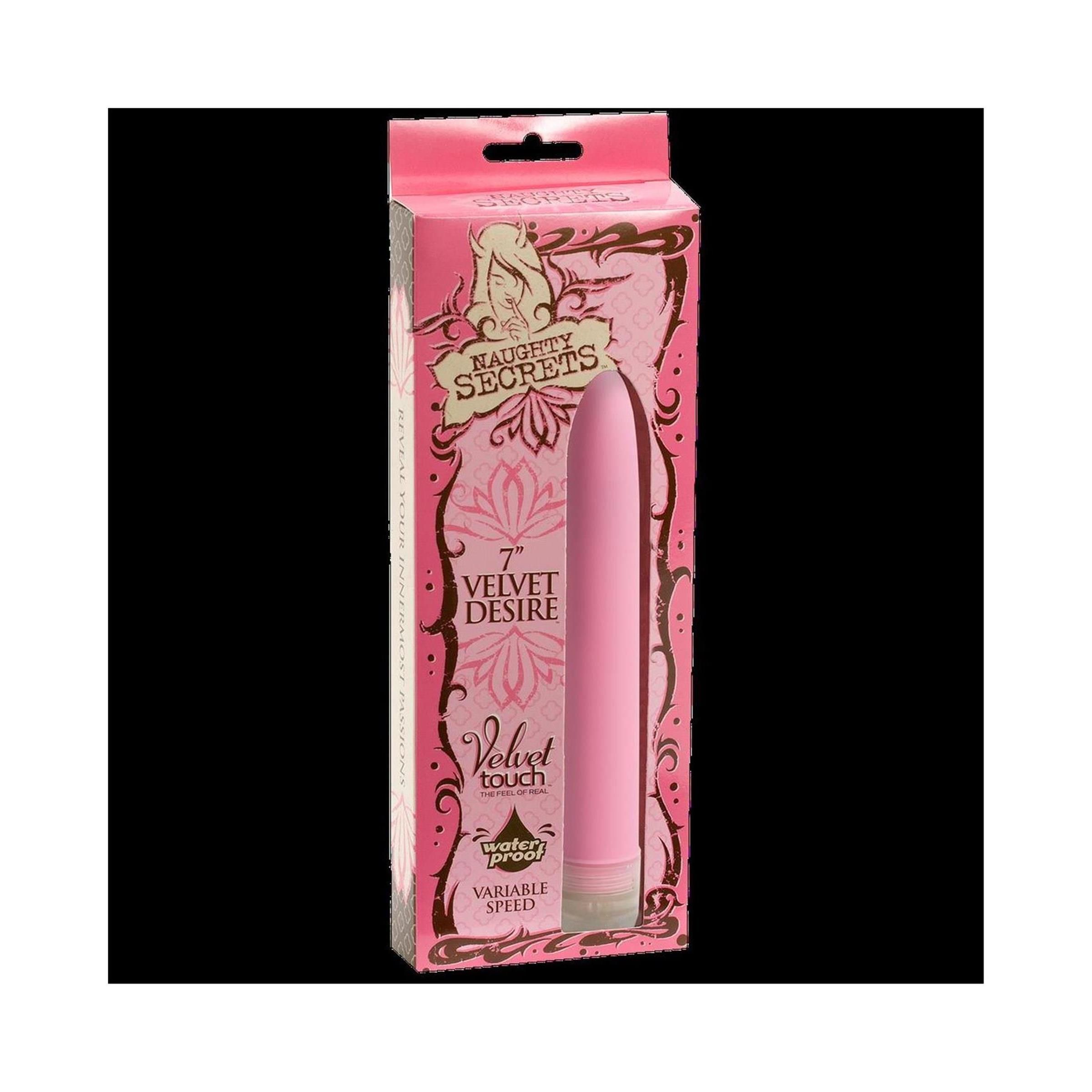 Rosa Vibrator in Verpackung. Aufschrift: Velvet Desire, Naughty Secrets. Variable Geschwindigkeit.