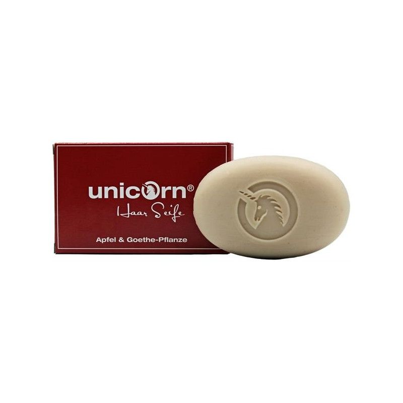 Haarseife mit Logo und Schriftzug. Rote Verpackung mit Schriftzug. Oval geformte Seife mit Einhorn-Logo.