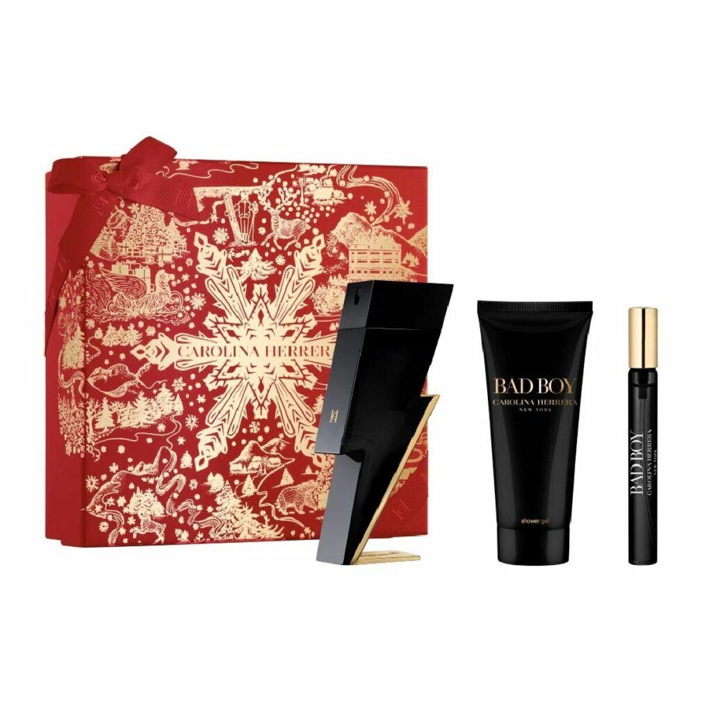 Geschenkset mit Parfümflakon, Duschgel und Duftprobe. Schwarze Flakons und Tube mit goldfarbenen Akzenten. Rote Geschenkbox mit Schleife.