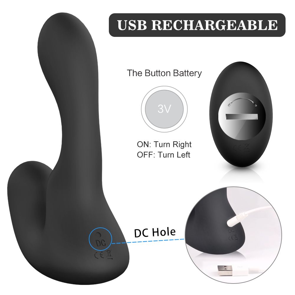 Schwarzer Vibrator mit Ladeanschluss. Eine Fernbedienung und eine Batterie sind abgebildet.
