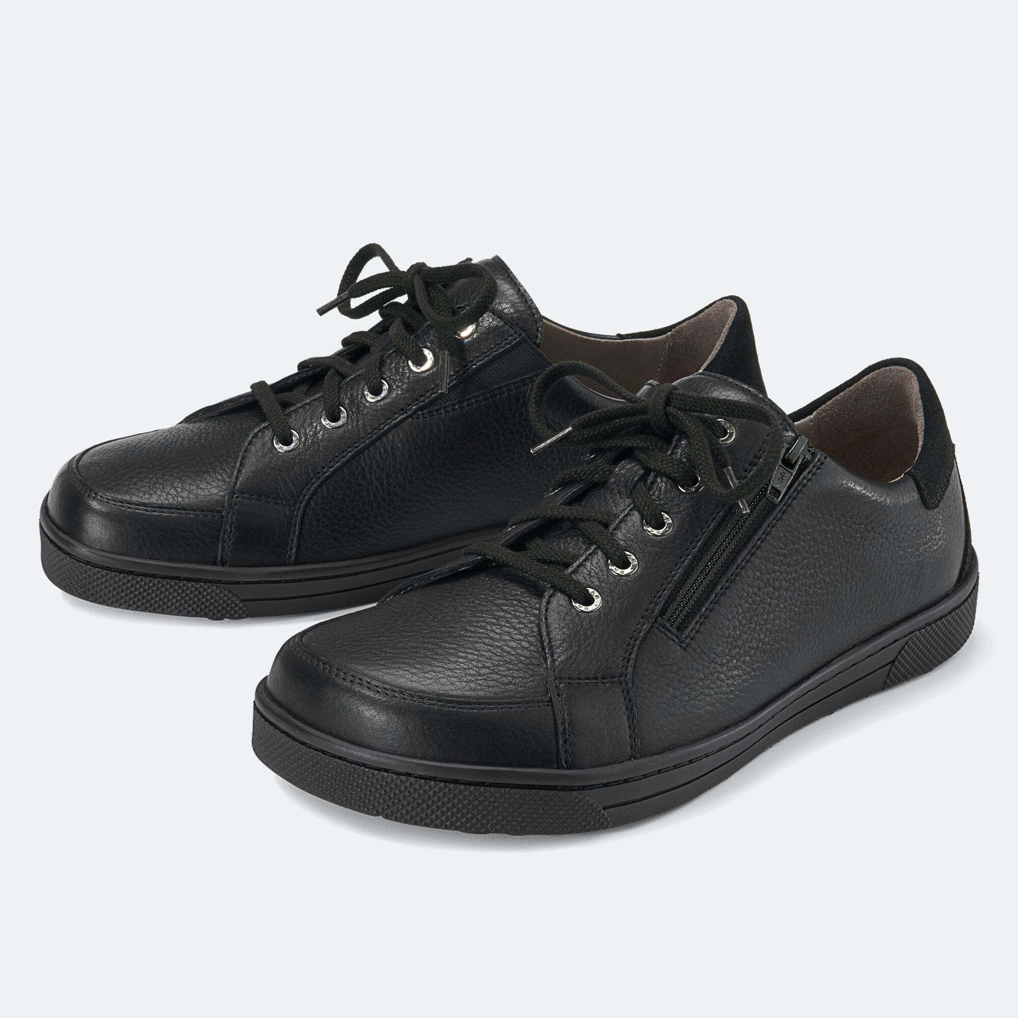 Schwarze Lederhalbschuhe mit Schnürung und seitlichem Reißverschluss.