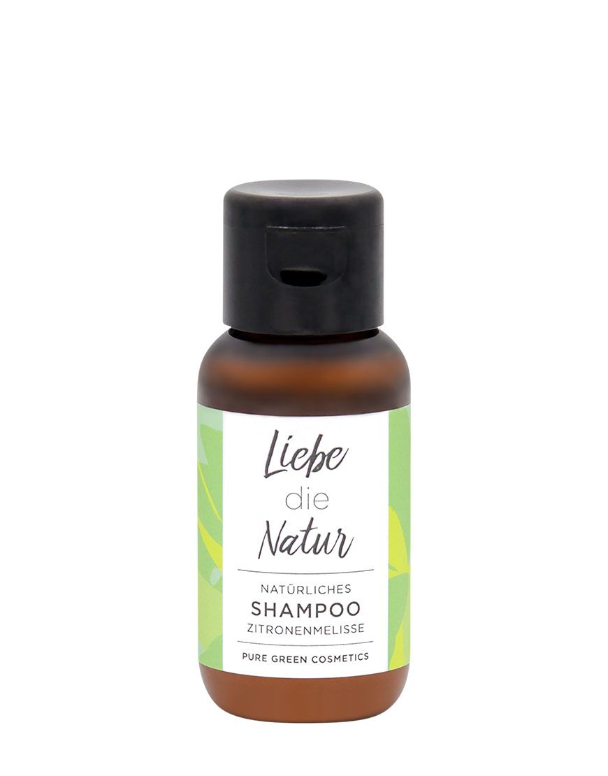 Braune Flasche mit schwarzem Klappverschluss. Etikett mit Schriftzug "Liebe die Natur", "Shampoo Zitronenmelisse".