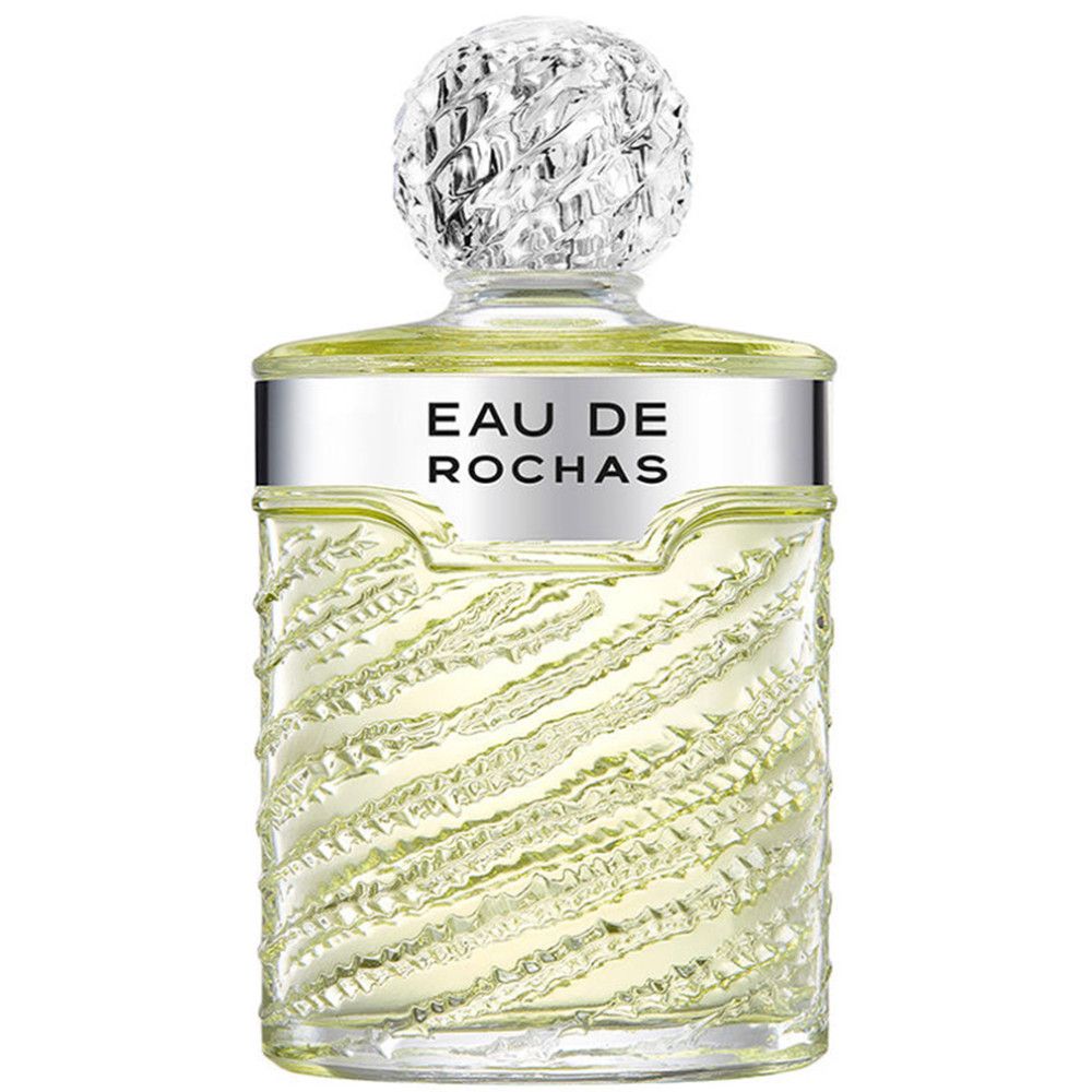 Parfümflakon mit silbernem Deckel und Schriftzug. Flakon mit geriffelter Oberfläche.