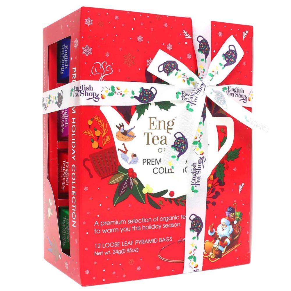 Rote Geschenkbox mit Schleife. Aufdruck: English Tea Shop, Winter Kollektion. Enthält Teebeutel. Schneeflocken-Dekor.