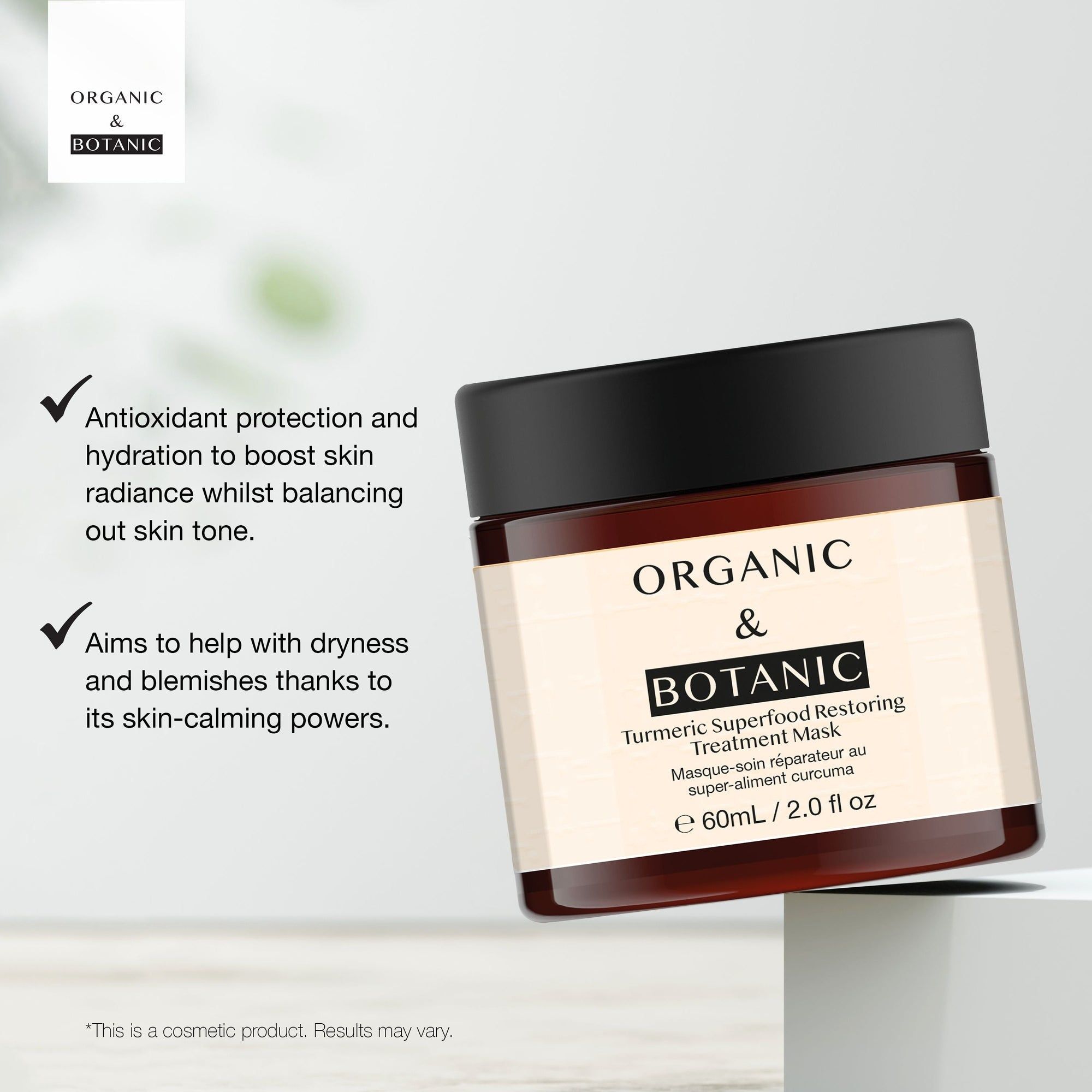 Braune Glasdose mit schwarzem Deckel. Aufschrift: ORGANIC & BOTANIC, Turmeric Superfood Restoring Treatment Mask. Mit Text und Häkchen.