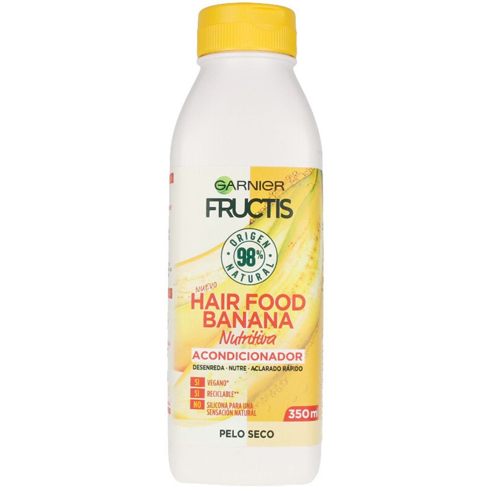 Weiße Flasche mit gelbem Deckel. Aufkleber mit Garnier Fructis Hair Food Banane. Vegan, recycelbar. 350ml.