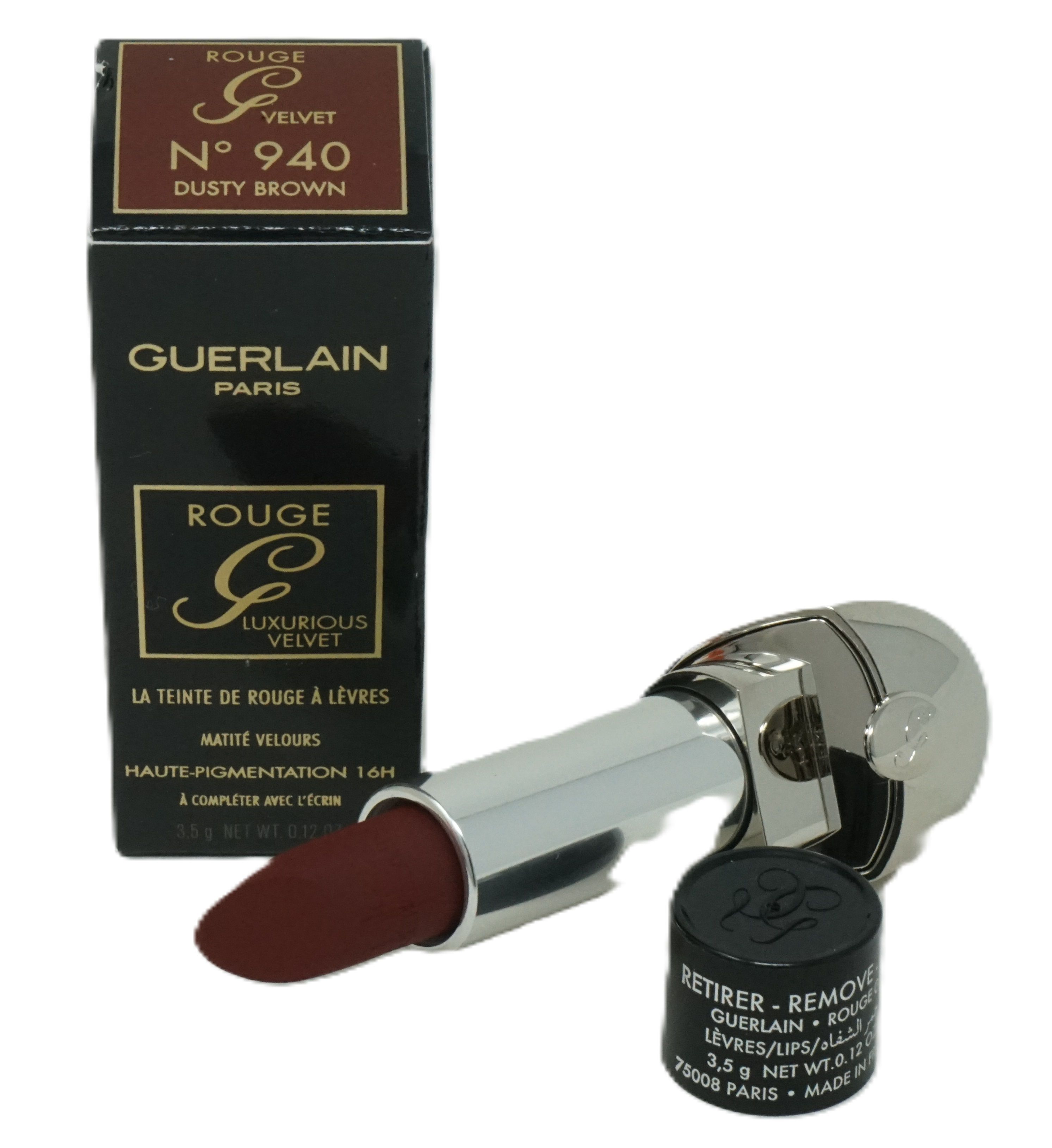 Lippenstift und Verpackung. Schwarze Schachtel mit Produktnamen und -details. Lippenstift in Braun, silberfarbener Hülse. Schwarzer Deckel mit Logo.