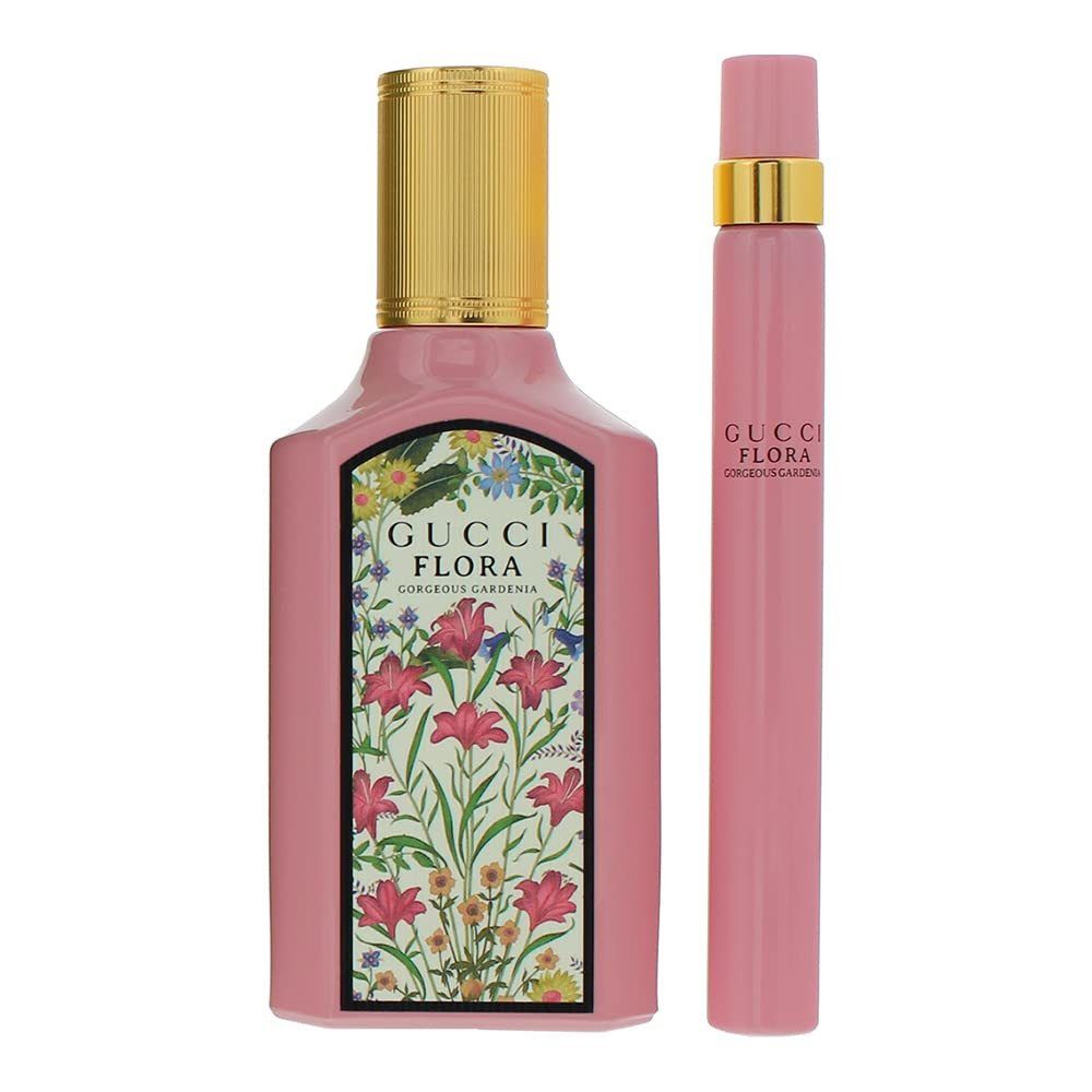 Rosa Parfümflasche und Zerstäuber. Beide mit goldenen Verschlüssen und Gucci Flora-Etiketten.