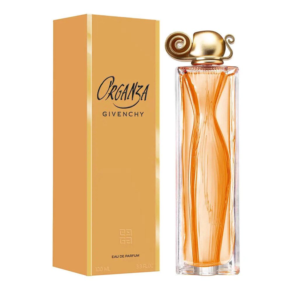Organza Eau de Parfum von Givenchy in einem rechteckigen Glasflakon mit goldenem Verschluss. Orangefarbene Flüssigkeit. Beigefarbene Verpackung.