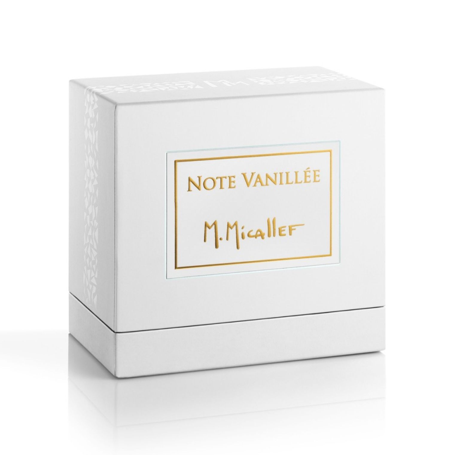 Weiße quadratische Verpackung mit goldenem Schriftzug. Aufschrift: Note Vanillée, M.Micallef.