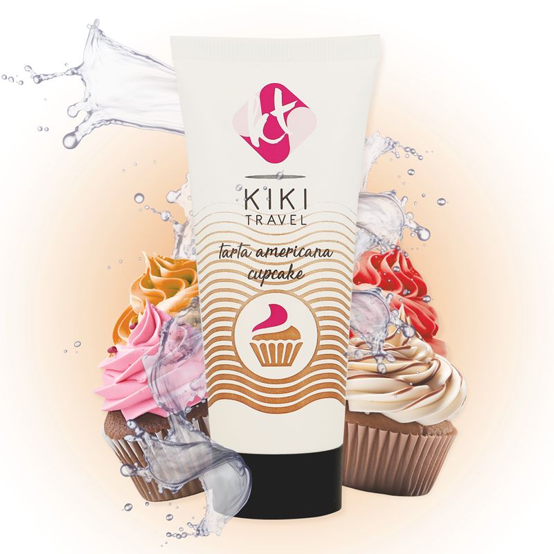 Tube Gleitgel "KIKI TRAVEL" mit Aufdruck "tarta americana cupcake". Umgeben von Cupcakes und Wasserspritzern.