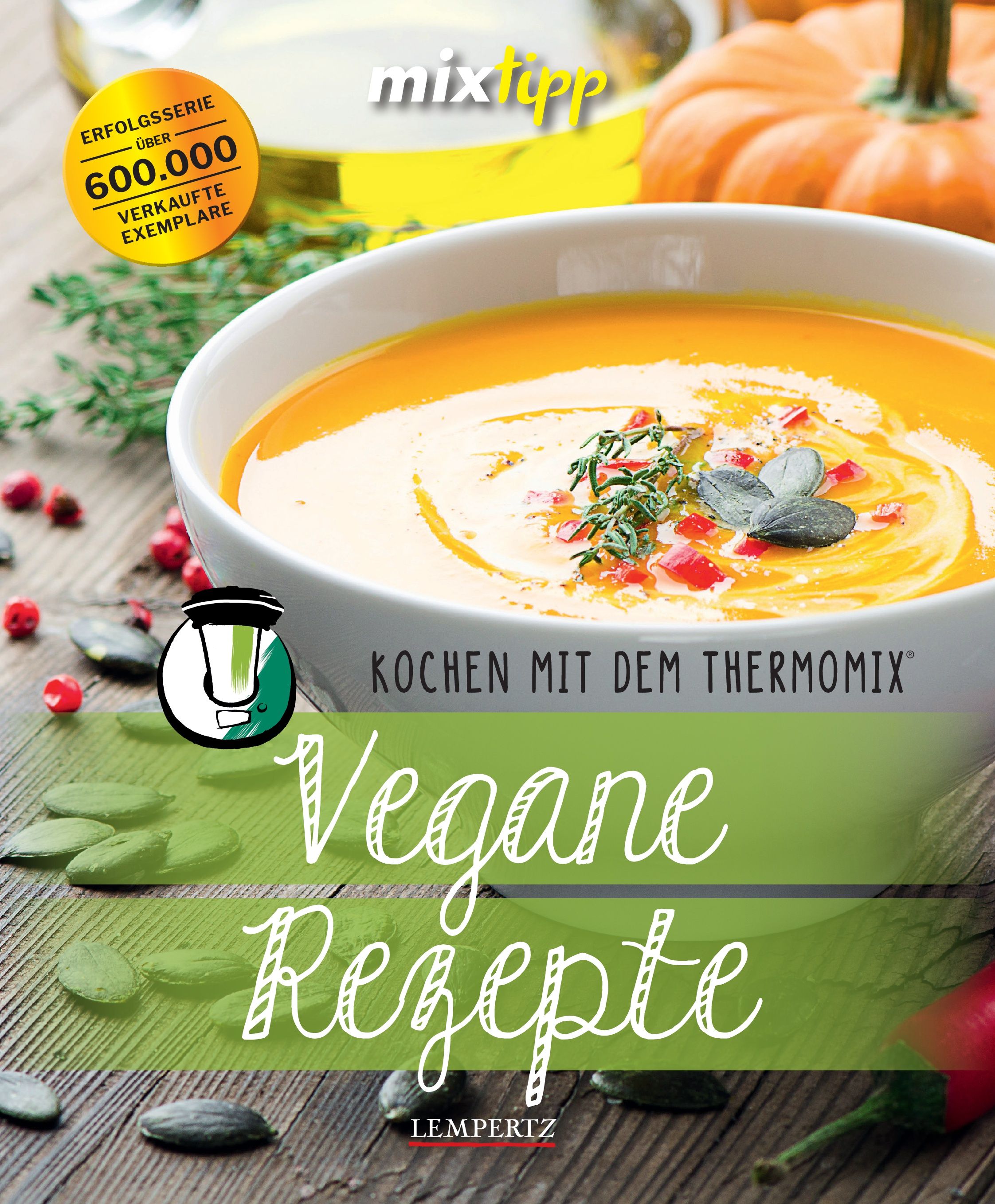 Kochbuch "Vegane Rezepte" mit Schriftzug. Aufschrift: Kochen mit dem Thermomix. Auf dem Cover eine Suppe in einer Schüssel.