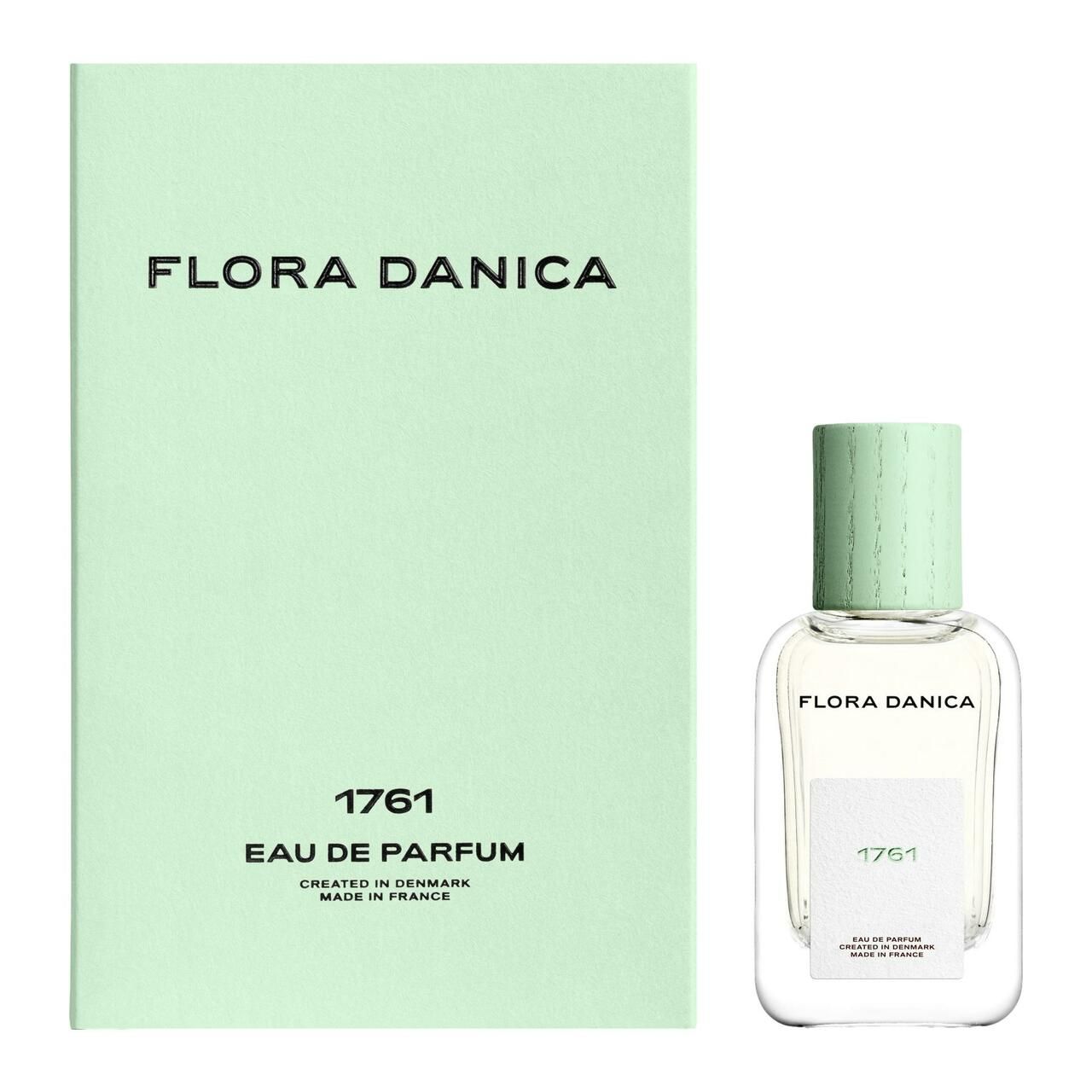 Parfümflasche und Schachtel. Auf der Schachtel und dem Etikett steht "Flora Danica 1761".
