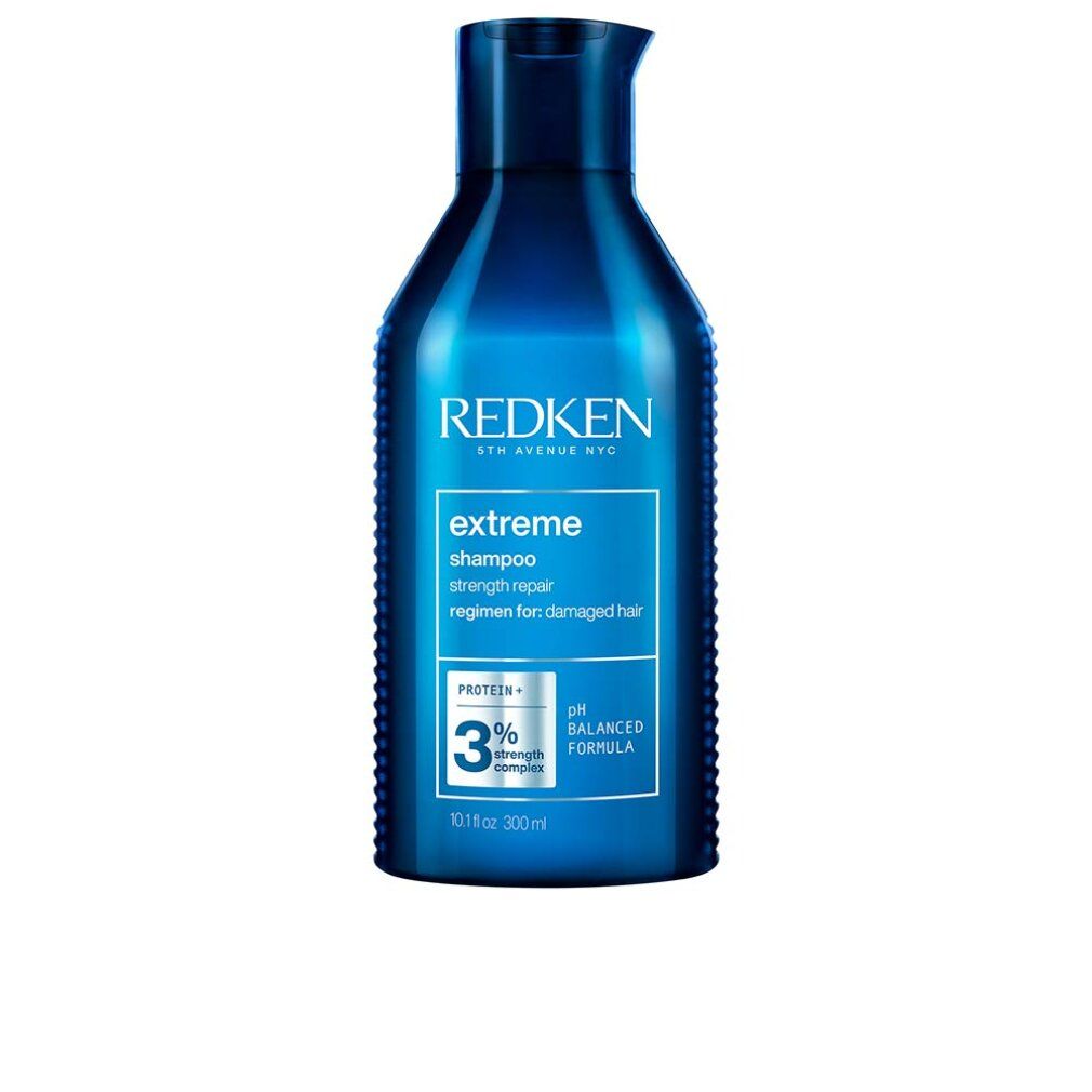 Dunkelblaue Shampoo-Flasche mit "Redken extreme" Aufschrift. Enthält 3% Strength Complex. 300ml.
