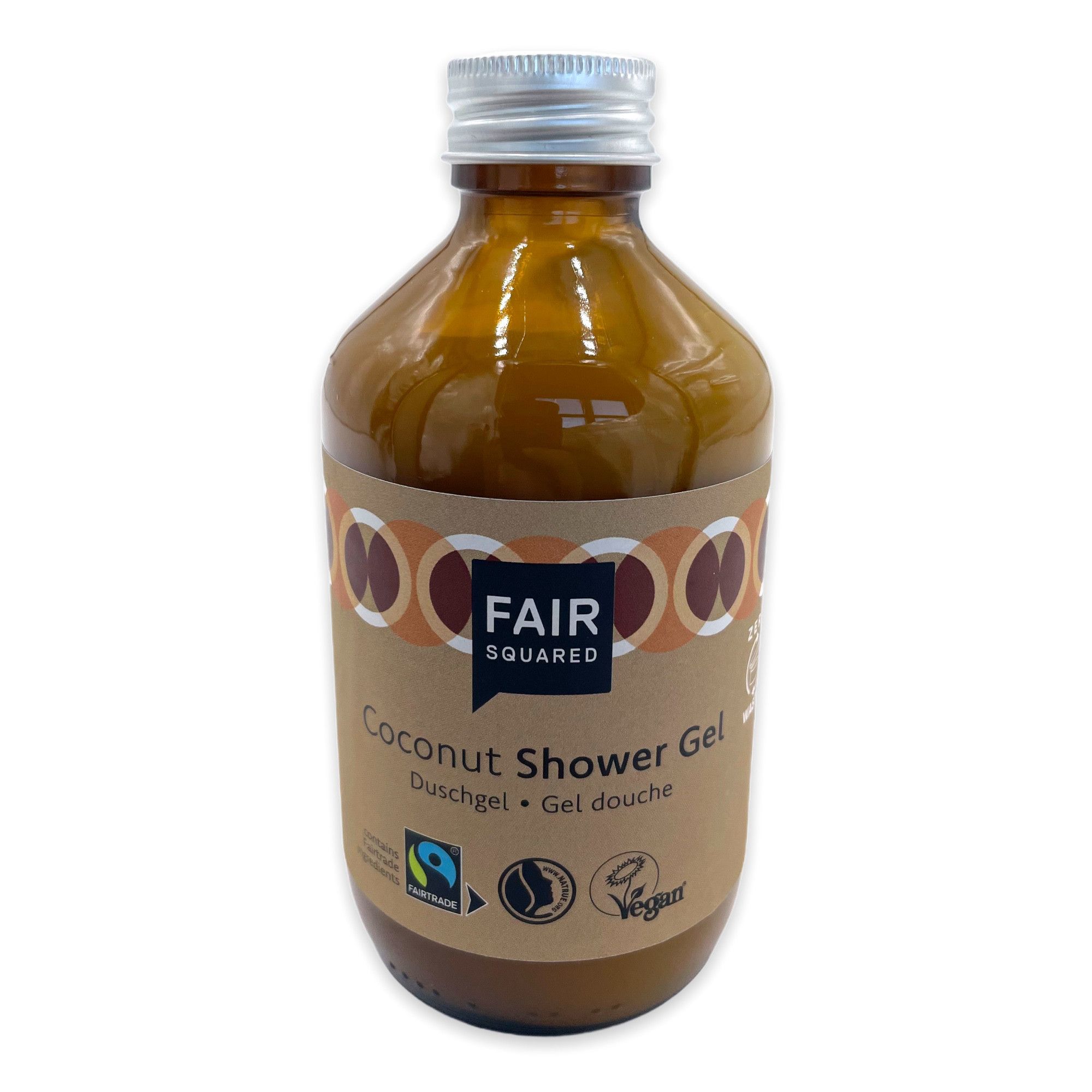 Braune Glasflasche mit silbernem Deckel. Aufschrift: FAIR SQUARED Coconut Shower Gel. Siegel: Fairtrade, Vegan.