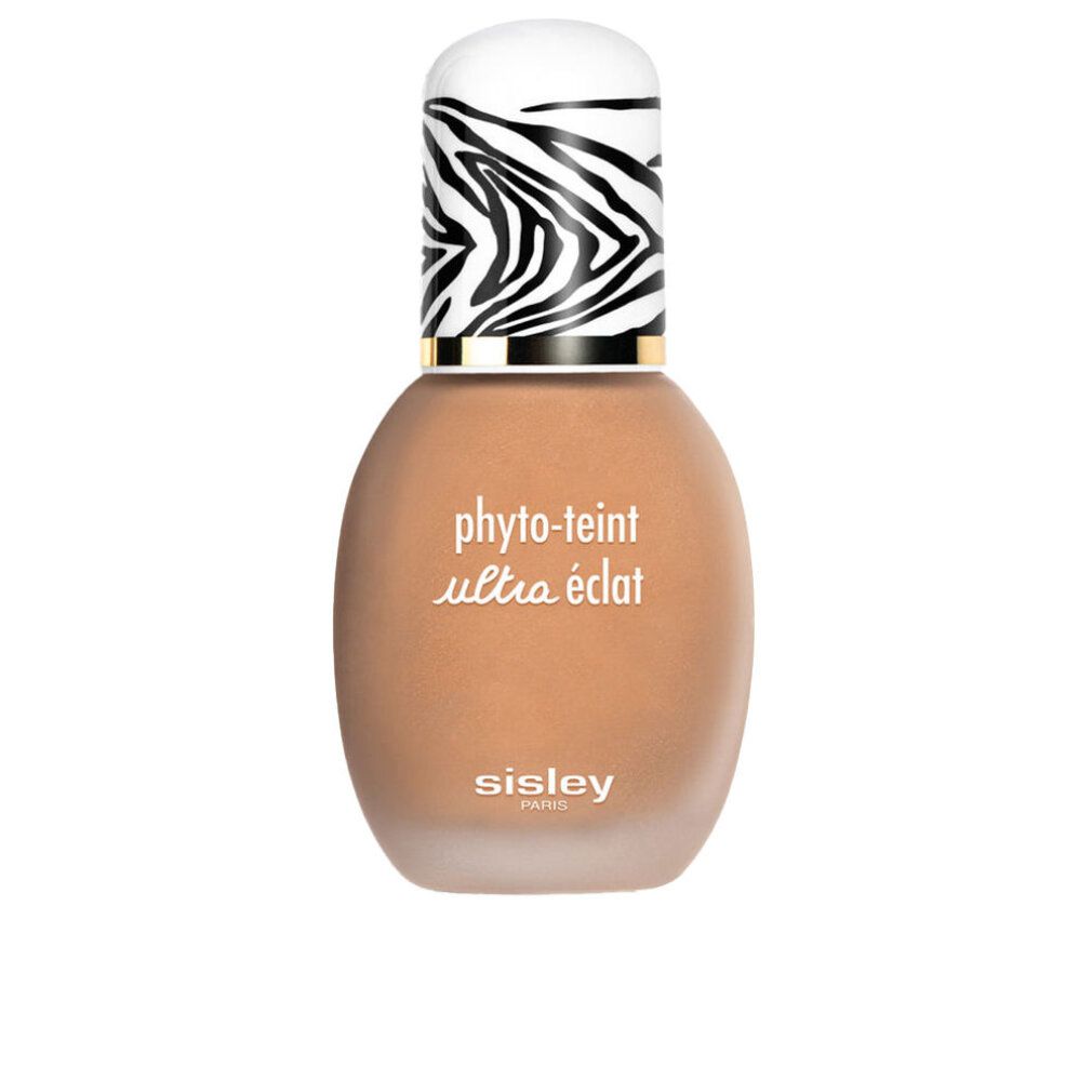 Flakon Sisley Phyto-Teint Ultra Eclat. Zebra-Muster auf dem Deckel. Text: Oil free - long lasting foundation.