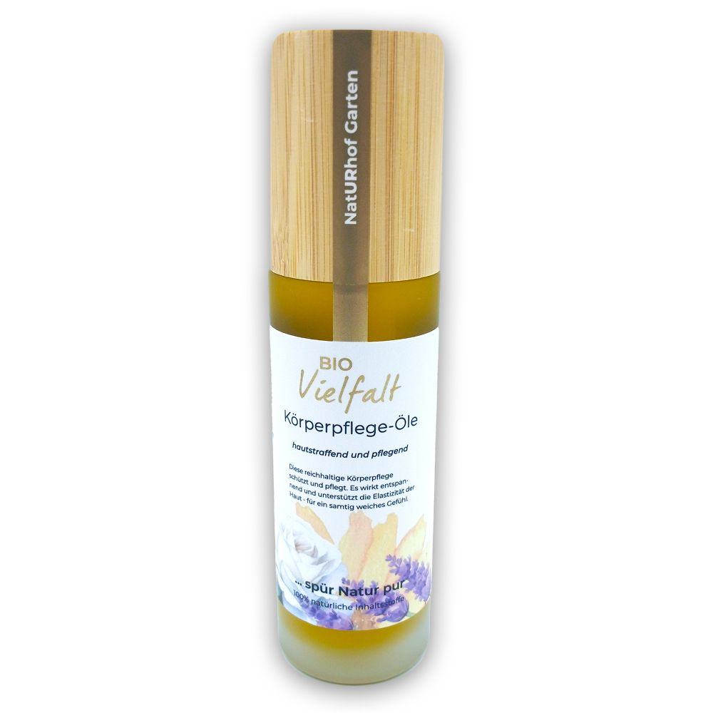 Körperpflege-Öl-Flasche mit Holzdeckel. Aufschrift: BIO Vielfalt Körperpflege-Öle. Etikett mit floralem Design und Text.