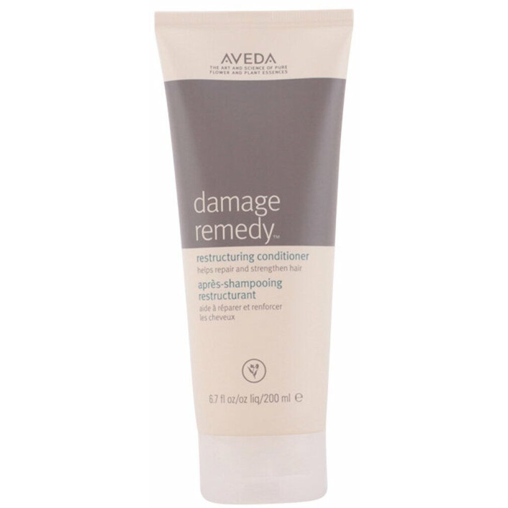 Creme-Tube mit Produktnamen und Markennamen. Text: Damage Remedy, Restructuring Conditioner. 200 ml.