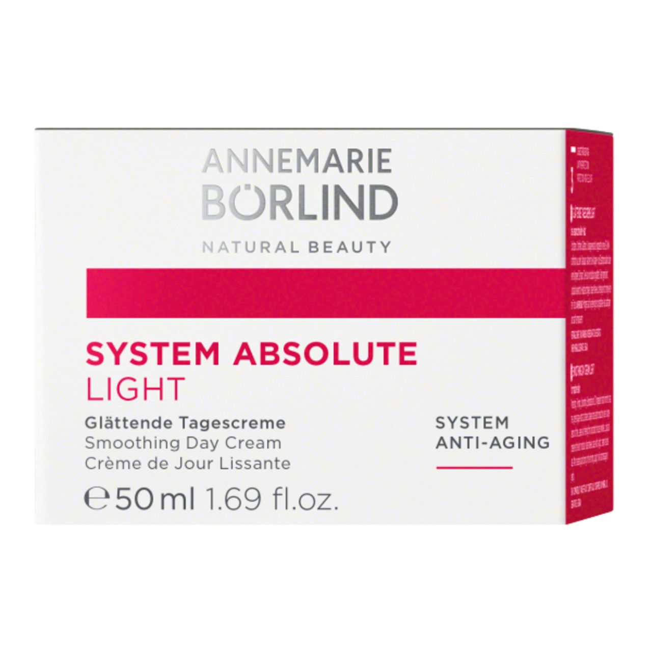 Weiße Schachtel mit rotem Streifen. Aufschrift: ANNEMARIE BÖRLIND, SYSTEM ABSOLUTE LIGHT, Glättende Tagescreme, Smoothing Day Cream, 50ml.